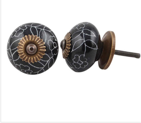 Black ceramic knob with floral design